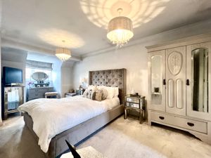 Bedroom One- click for photo gallery